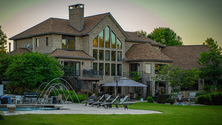 mansion on thelake, luxury, lakeside mansion, michigan, michigan retreats, booking vacation,