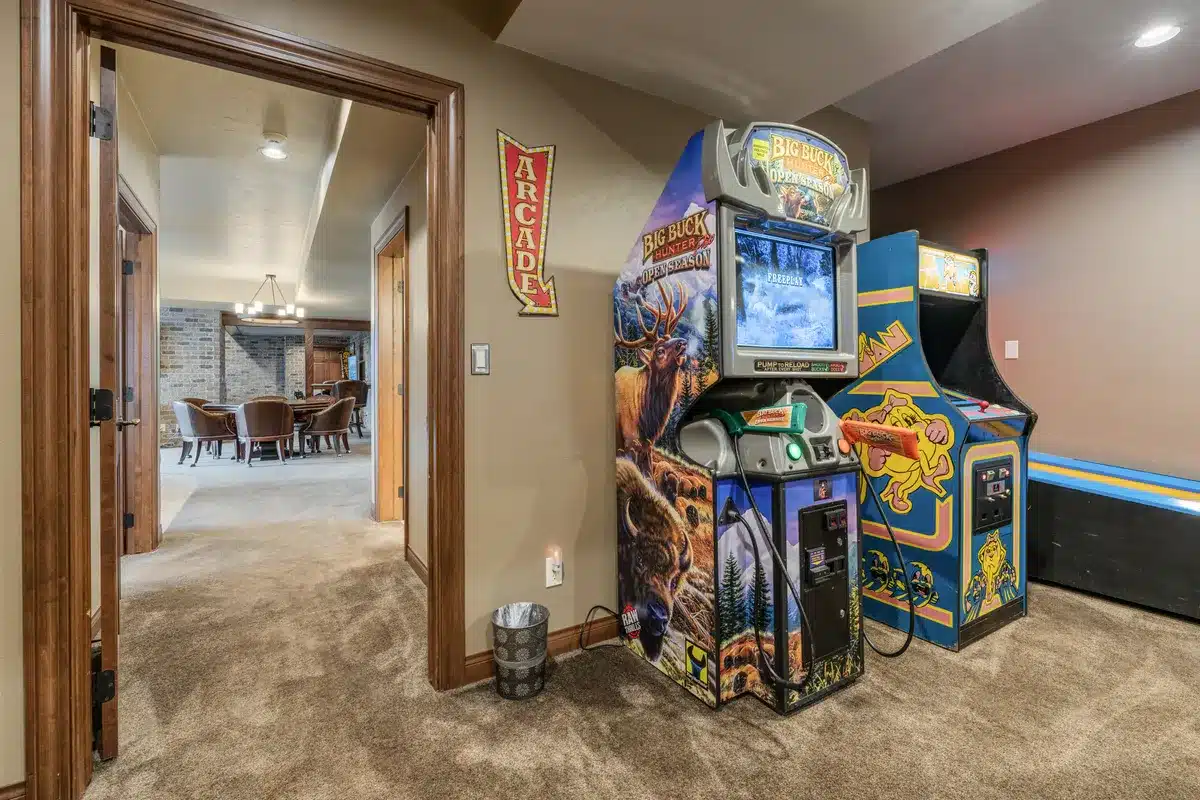 Nississing Cove Arcade at Mansion on the Lake with Cyclone, Pool Sharks pinball, Buck Hunter, Golden Tee, Cruisin' USA, Ms. Pac-Man, and Basket Fever skeeball